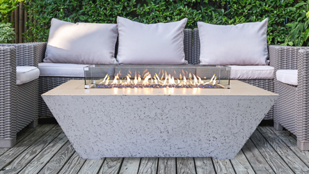 Chairs surrounded by a grand canyon log set firepit